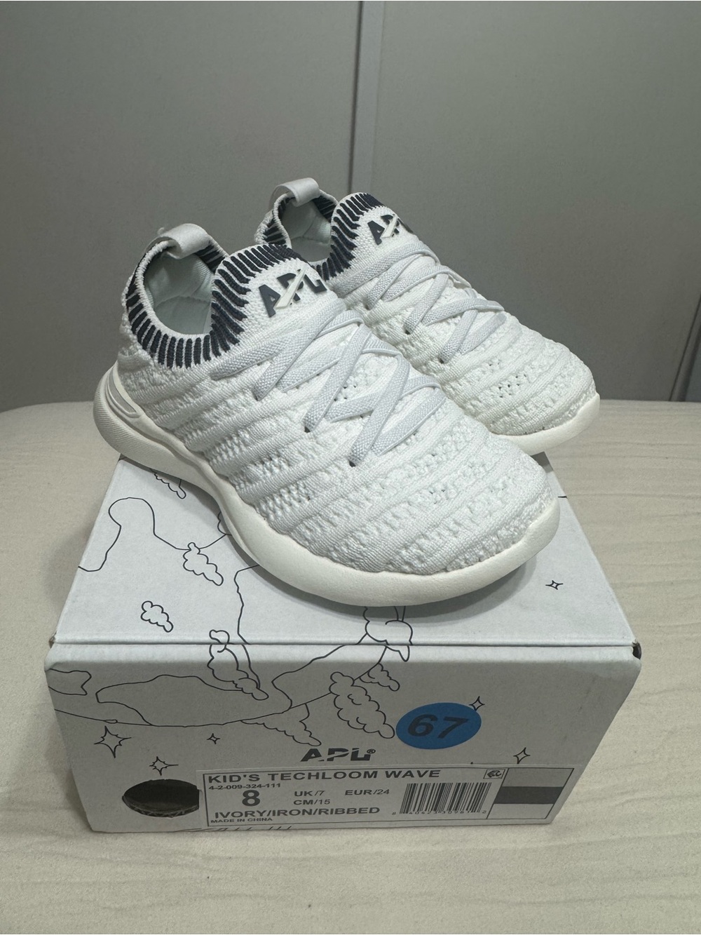 APL Kids' Techloom Wave Knit Sneaker in Ivory with Iron Ribbed Detail